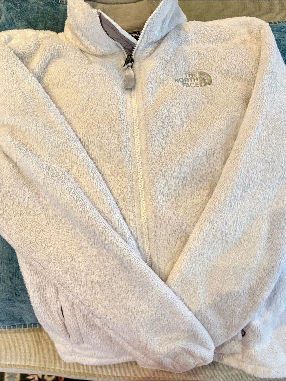 The North Face Plush Full-Zip Jacket in White, Gray accents.